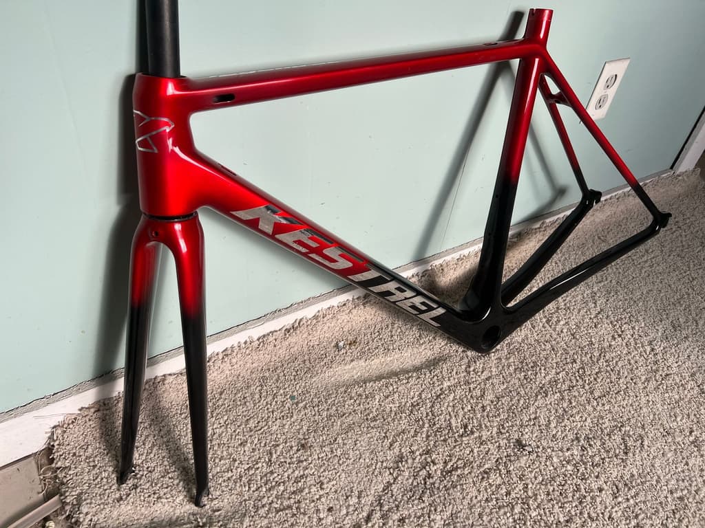 Finished road frame photographed at a customer's home after refinishing.