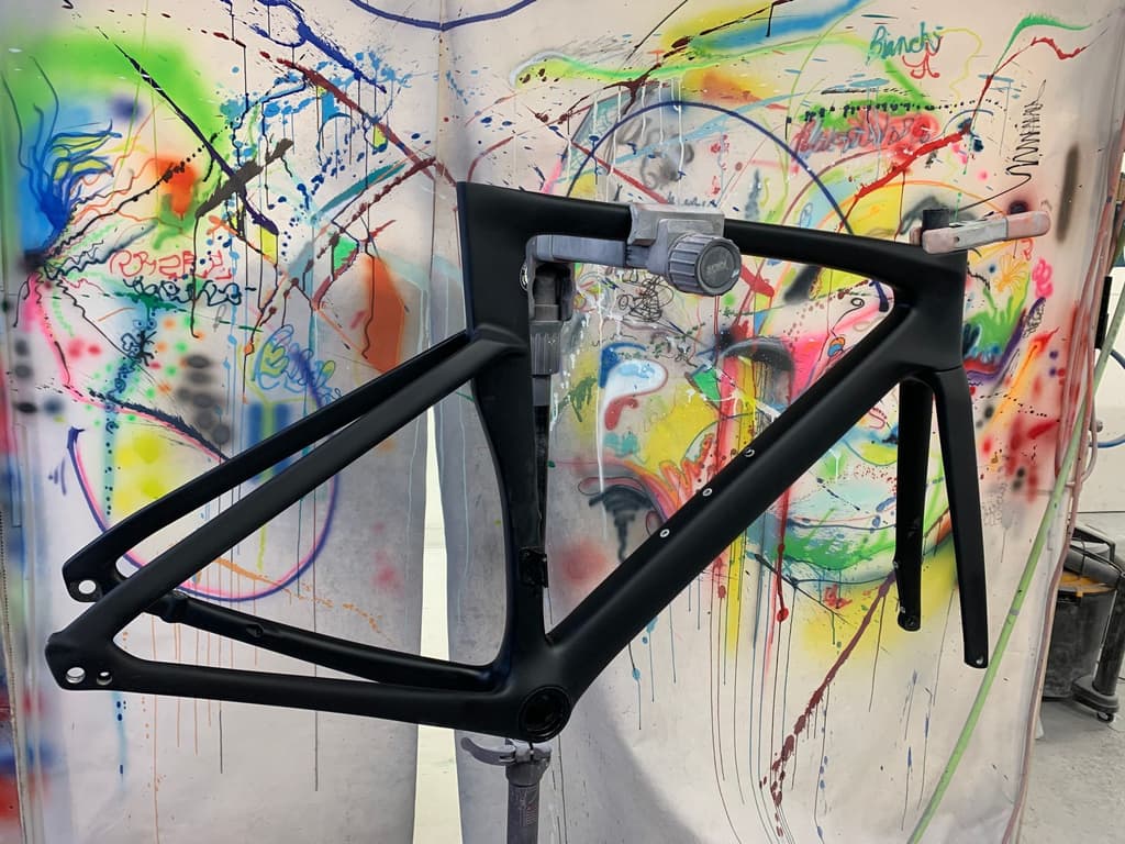 Road frame refinished in an unbranded stealth matte black.