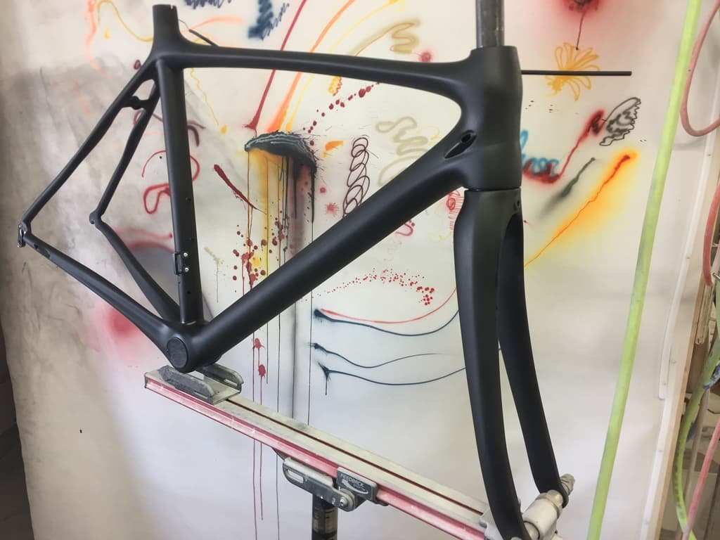 Unbranded road frame refinished in a satin black.