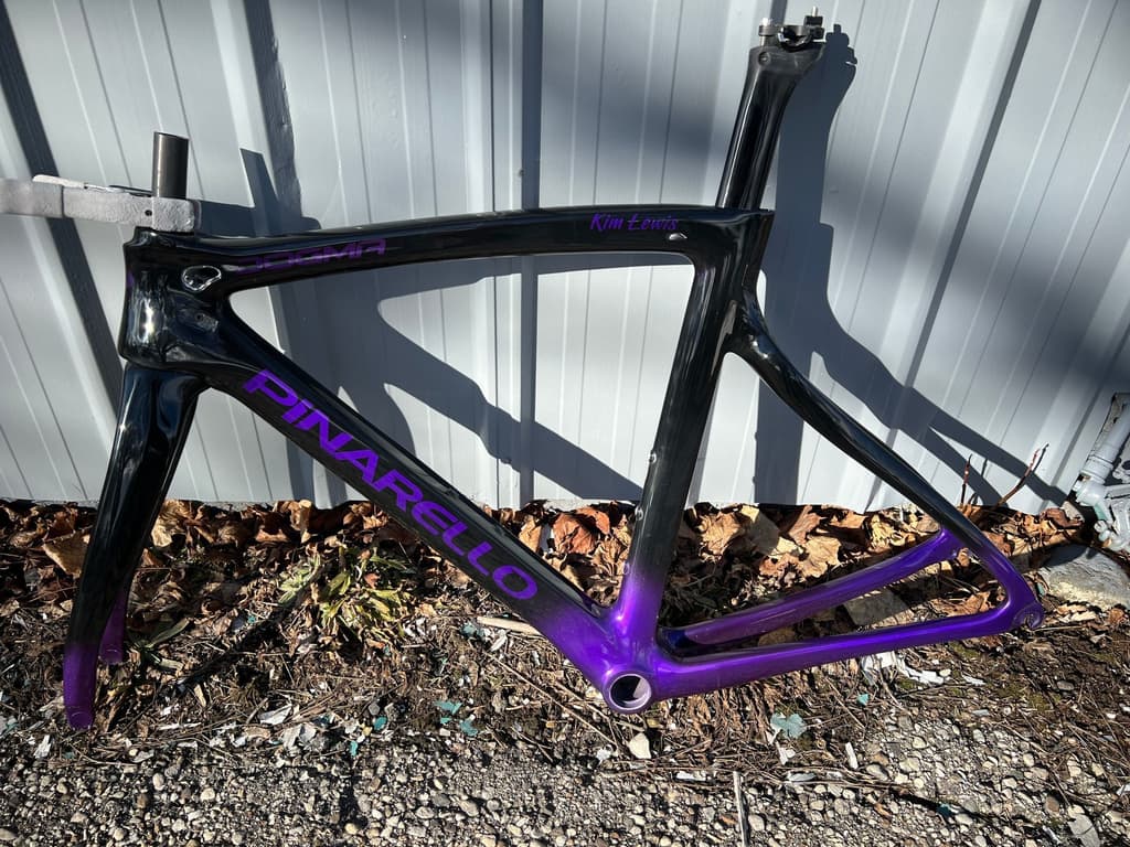 Road frame refinished with custom personalized lettering added to the frame.
