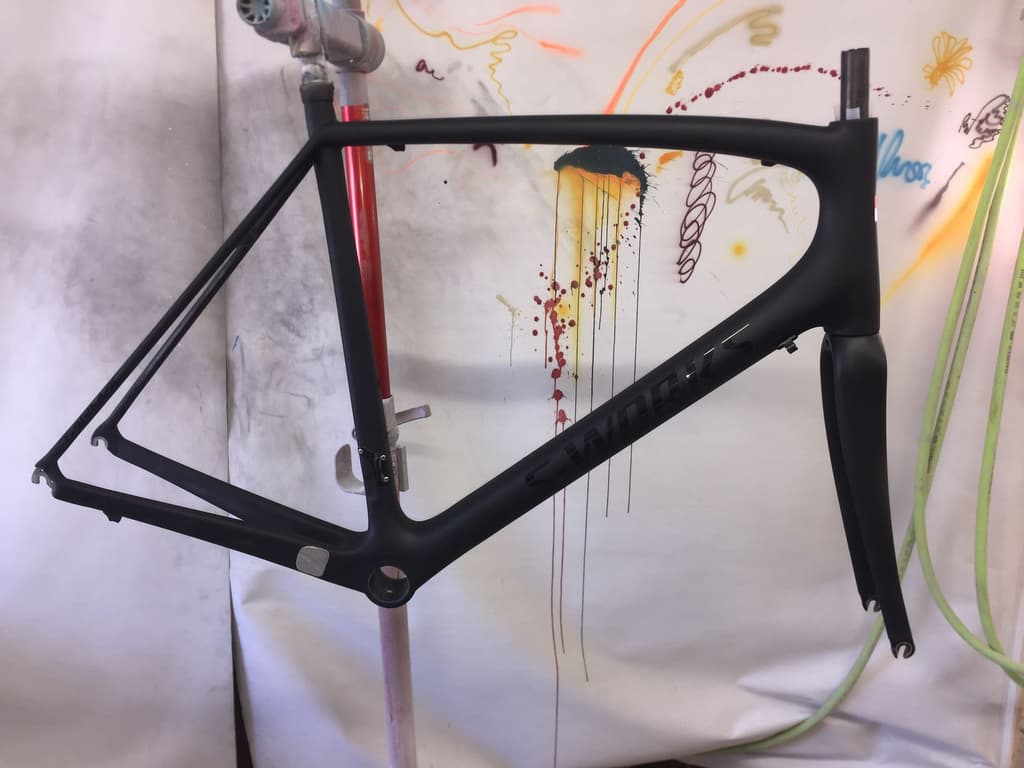 Specialized S-Works road frame refinished in a stealth matte black with the S-Works logo reproduced in tone-on-tone black.