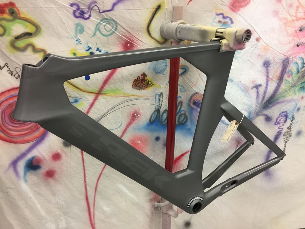 Trek road frame refinished in a matte grey with a CeramicSpeed bottom bracket decal visible.